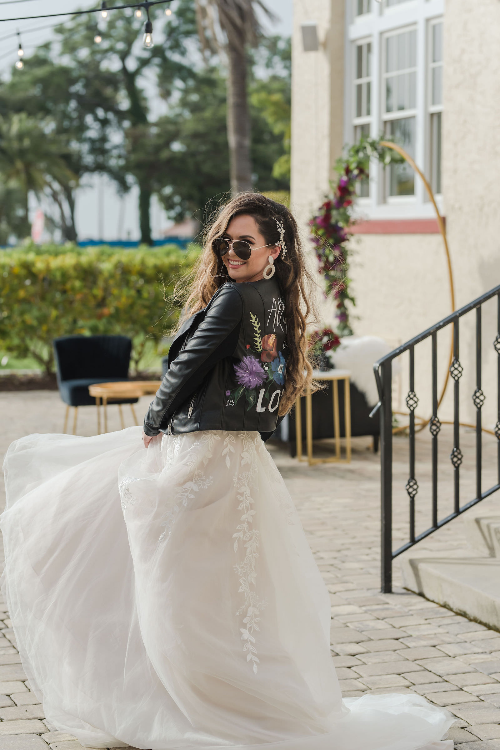 Modern Rock N Roll Bride Wearing Tulle Wedding Dress and Custom Black Leather Jacket and Sunglasses | Tampa Bay Wedding Photographer Amanda Zabrocki Photography