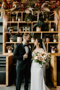 Modern Boho Bride and Groom Wedding Portrait with Neutral Floral Bouquet | Tampa Bay Wedding Florist Iza's Flowers | Unique South Tampa Wedding Venue Hyde House