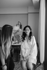 Boho Modern Bride Getting Wedding Hair and Makeup Done by Adore Bridal
