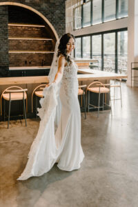 Modern Boho Bride Wearing Lace Fitted Wedding Dress | Tampa Bay Wedding Hair and Makeup Adore Bridal Hair and Makeup Group