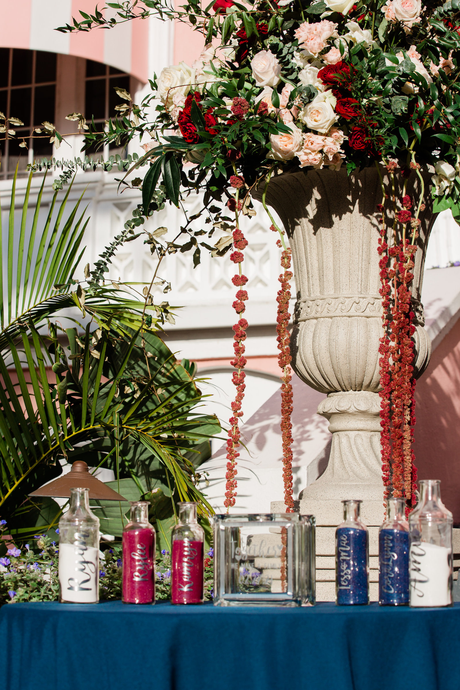 Elegant Navy Wedding Ceremony Decor, White Vase with Lush Greenery, Blush Pink, Red and Ivory Roses, Red Hanging Amaranthus | Tampa Bay Wedding Florist Botanica