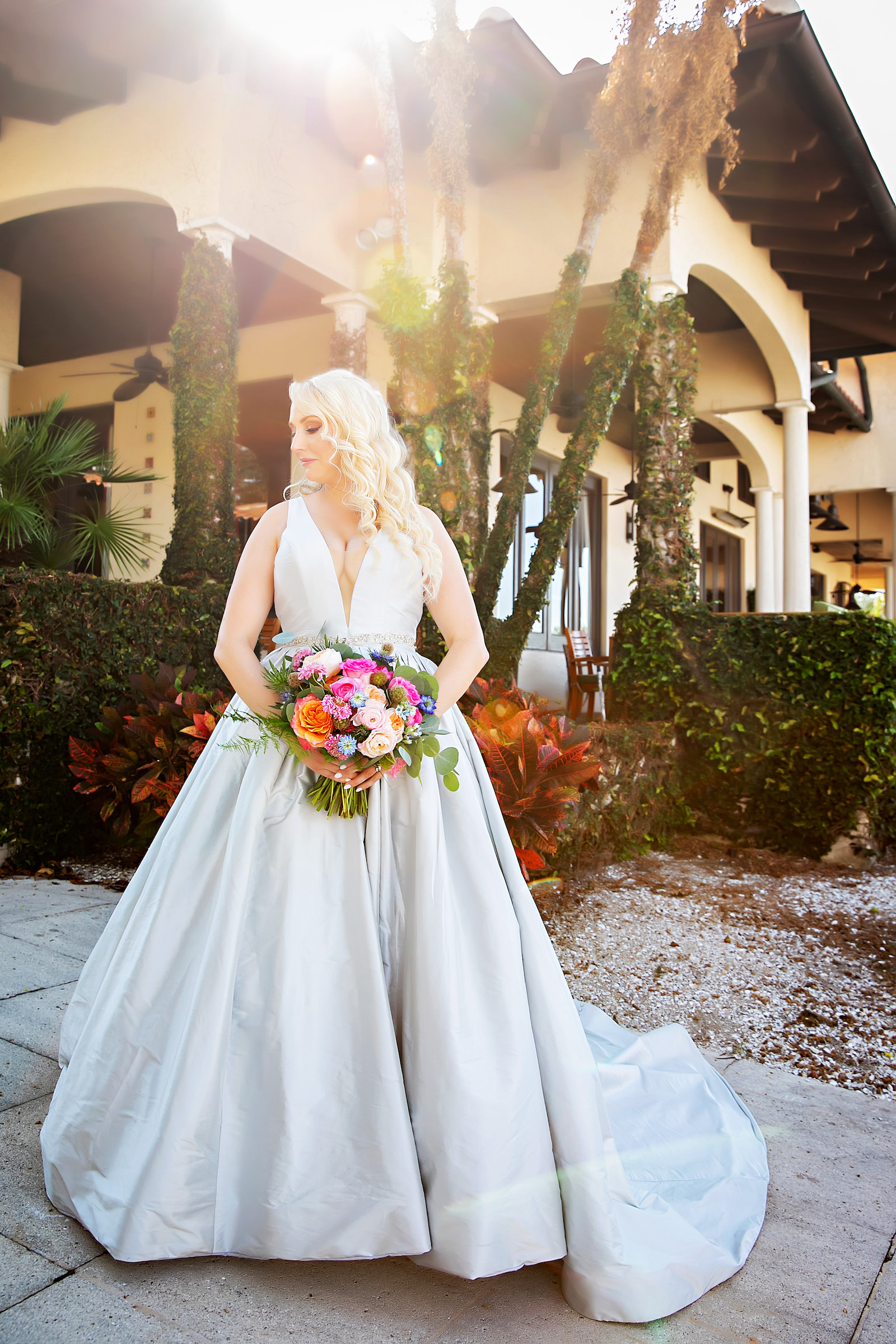 Bride in Deep V Classic Wedding Ballgown Portrait | Florida Hair and Makeup Artist Femme Akoi | The Resort at Longboat Key Club | Florida Wedding Photographer Limelight Photography