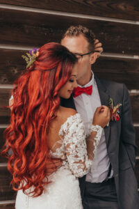 Bright Red Headed Bride with Classic Half Up in Intimate Wedding Portrait with Groom