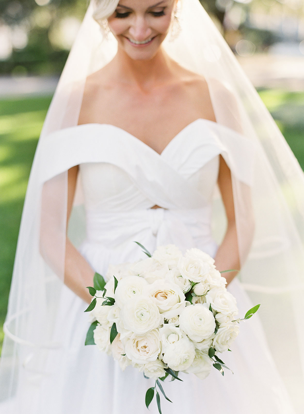 Classic Bride Wearing Off the Shoulder A-Line Wedding Dress Holding All White Roses Bouquet | Tampa Bay Wedding Florist Botanica International Design Studio