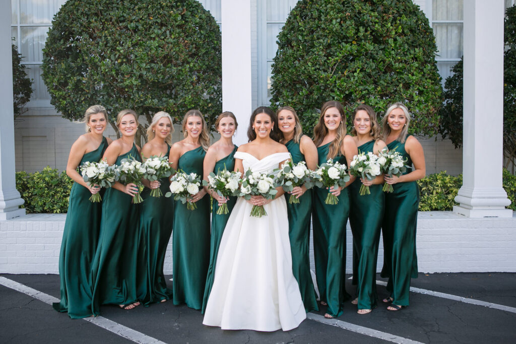 Green and Gold Wedding, Bride and Bridesmaids Wearing Matching One Shoulder Emerald Green Dresses | Tampa Bay Wedding Photographer Carrie Wildes Photography | Bella Bridesmaids
