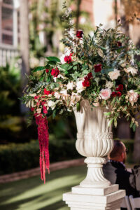 Elegant Navy Wedding Ceremony Decor, White Vase with Lush Greenery, Blush Pink, Red and Ivory Roses, Red Hanging Amaranthus | Tampa Bay Wedding Florist Botanica