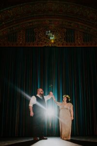 Bride and Groom Just Married in Tampa Theatre | Florida Wedding Photographer Regina as the Photographer