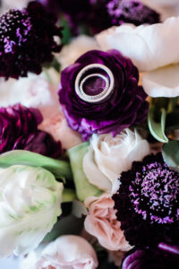 Elegant Navy Wedding, Dark Purple Flowers with Bride and Grooms Wedding Rings | Tampa Bay Wedding Florist Botanica
