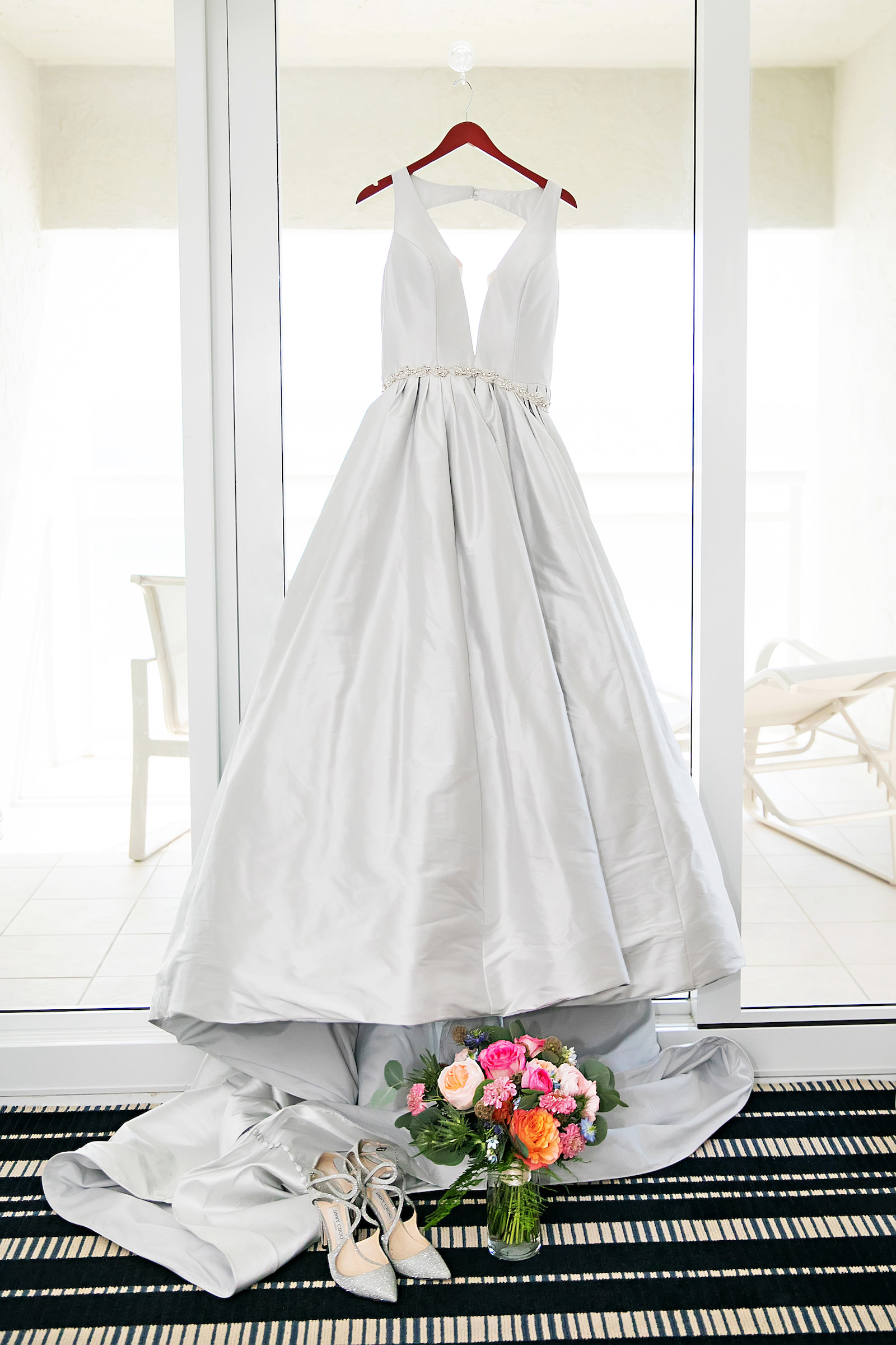 Deep V Neck Classic Simple Wedding Ballgown Hanging Portrait | Florida Photographer Limelight Photography
