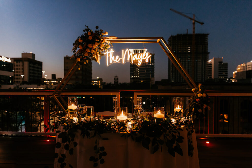 Romantic Boho Rooftop Wedding Reception with Neon Custom Sign | Downtown St. Petersburg Wedding Venue Red Mesa Events