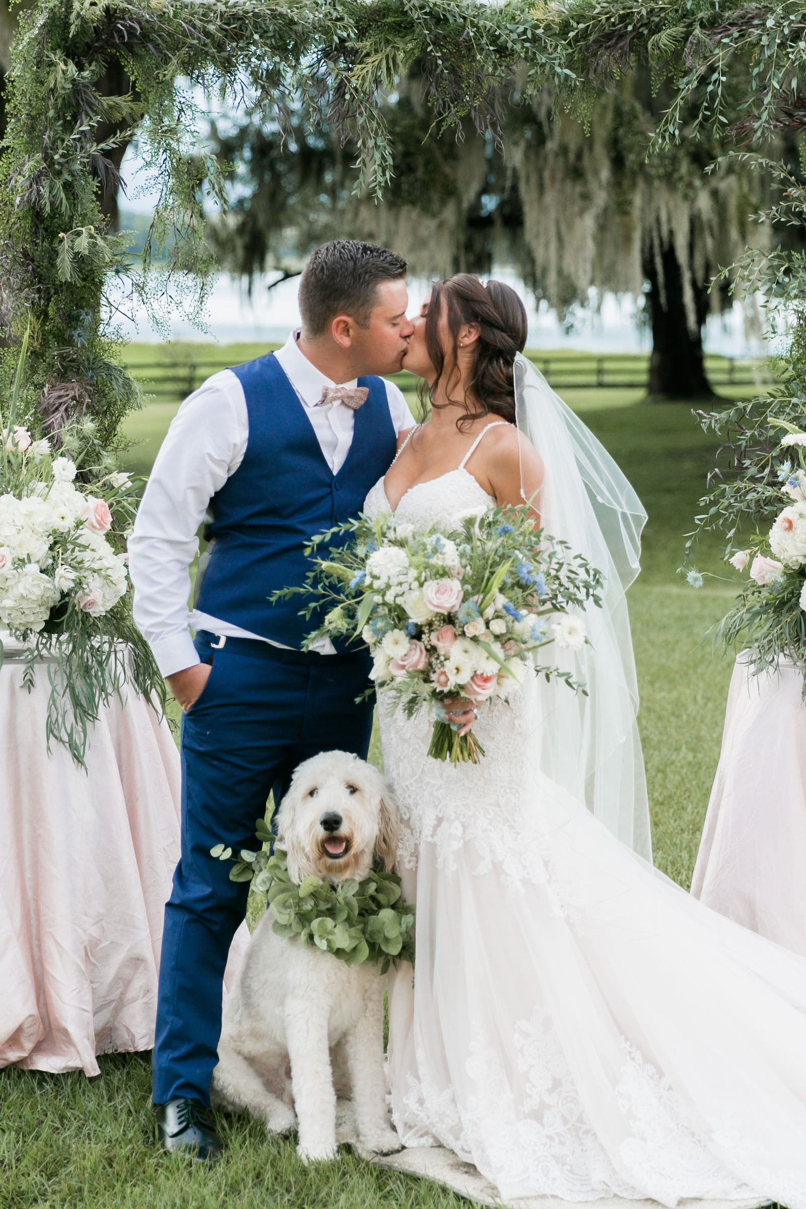 Bride and Groom Kissing with their Dog Pet Wedding Portrait | Tampa Florida Wedding Ceremony Covington Farms