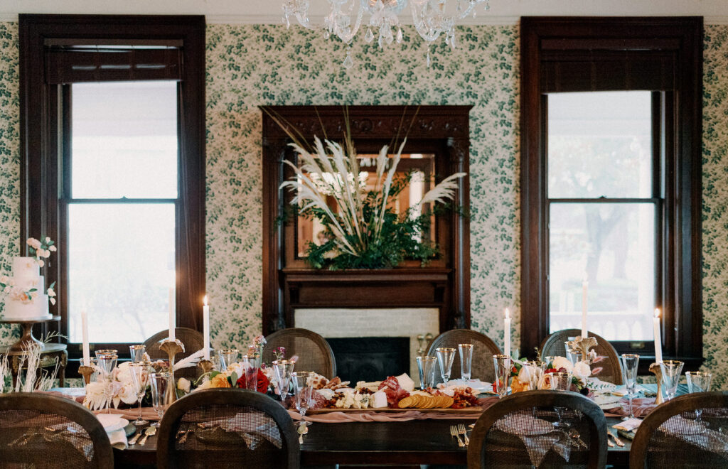 Vintage European Wedding, Charcuterie Board, Candlesticks, Dusty Rose Linen Table Runner, Pampas Grass and Greenery Floral Bouquet on Fireplace | Tampa Bay Wedding Photographer Dewitt for Love | Historic Wedding Venue Anderson House Tampa