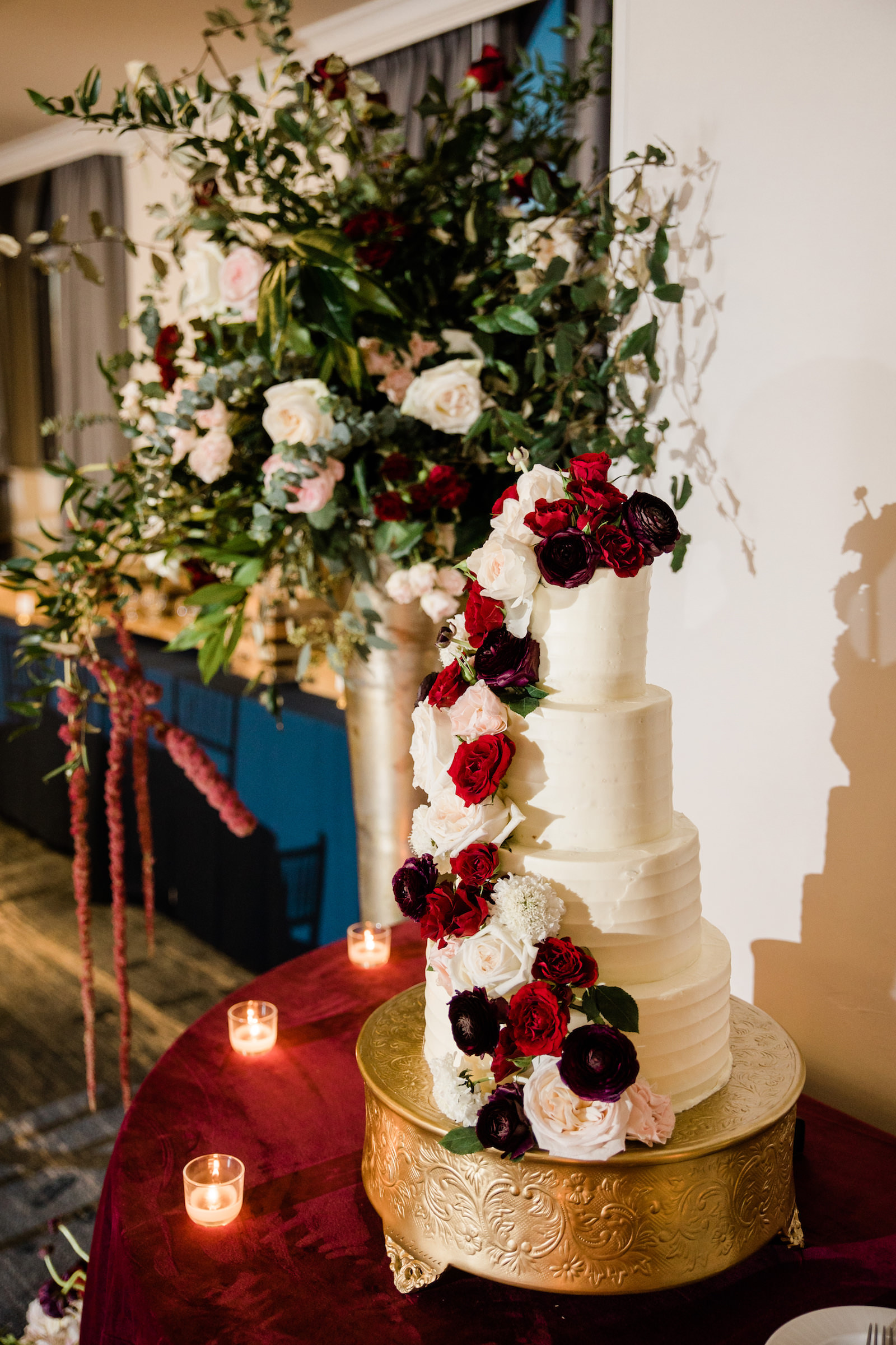 Elegant Navy Wedding, Four Tier Textured Wedding Cake with Cascading Blush Pink, Ivory, and Dark Purple Roses | Tampa Bay Wedding Florist Botanica