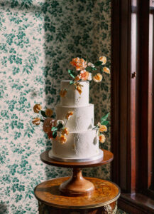 Vintage European Wedding, Three Tier White Wedding Cake with Yellow and Orange Sugar Flowers | Tampa Bay Wedding Photographer Dewitt for Love