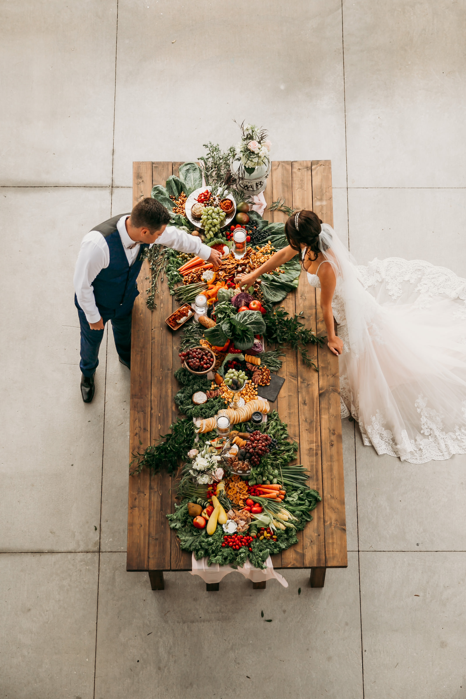 Bride and Groom Above Portrait with Charcuterie Table Wedding Portrait