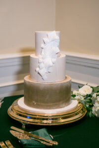 Green and Gold Wedding Reception Decor, Two Tier White and Gold Wedding Cake with White Sugar Flowers | Tampa Bay Wedding Photographer Carrie Wildes Photography