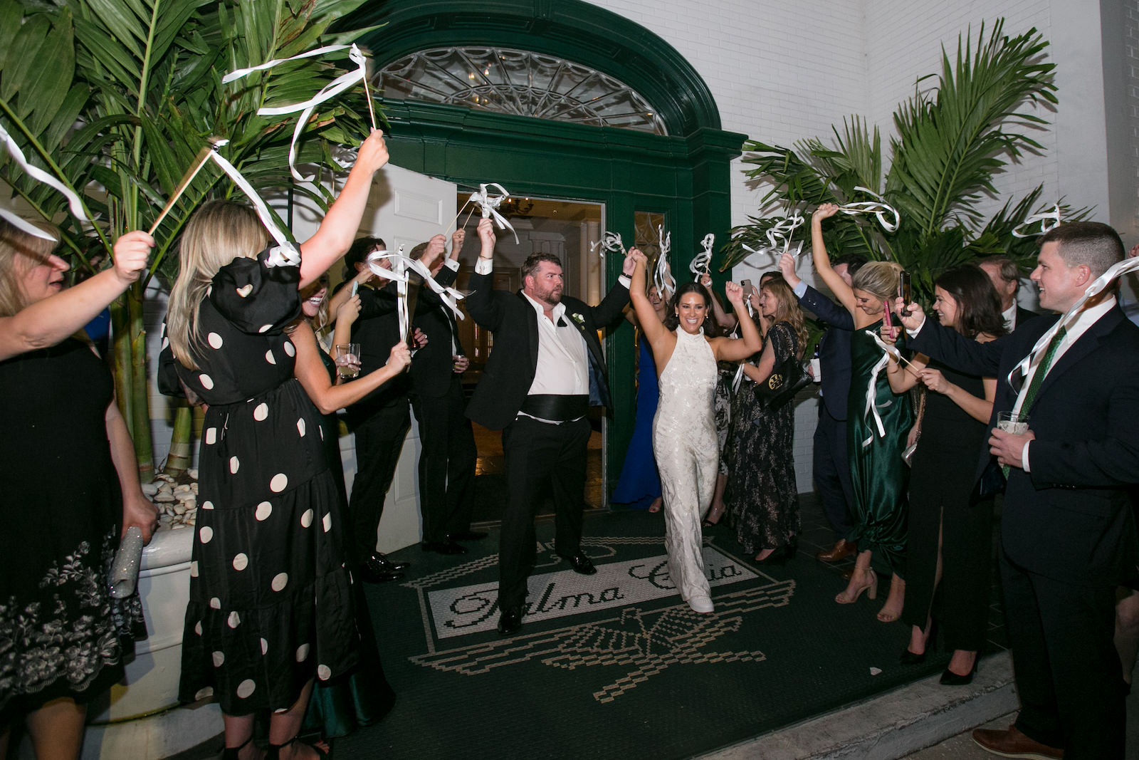 Green and Gold Christmas Wedding, Bride Wearing Wedding Jumpsuit and Groom Ribbon Reception Exit | Tampa Bay Wedding Photographer Carrie Wildes Photography