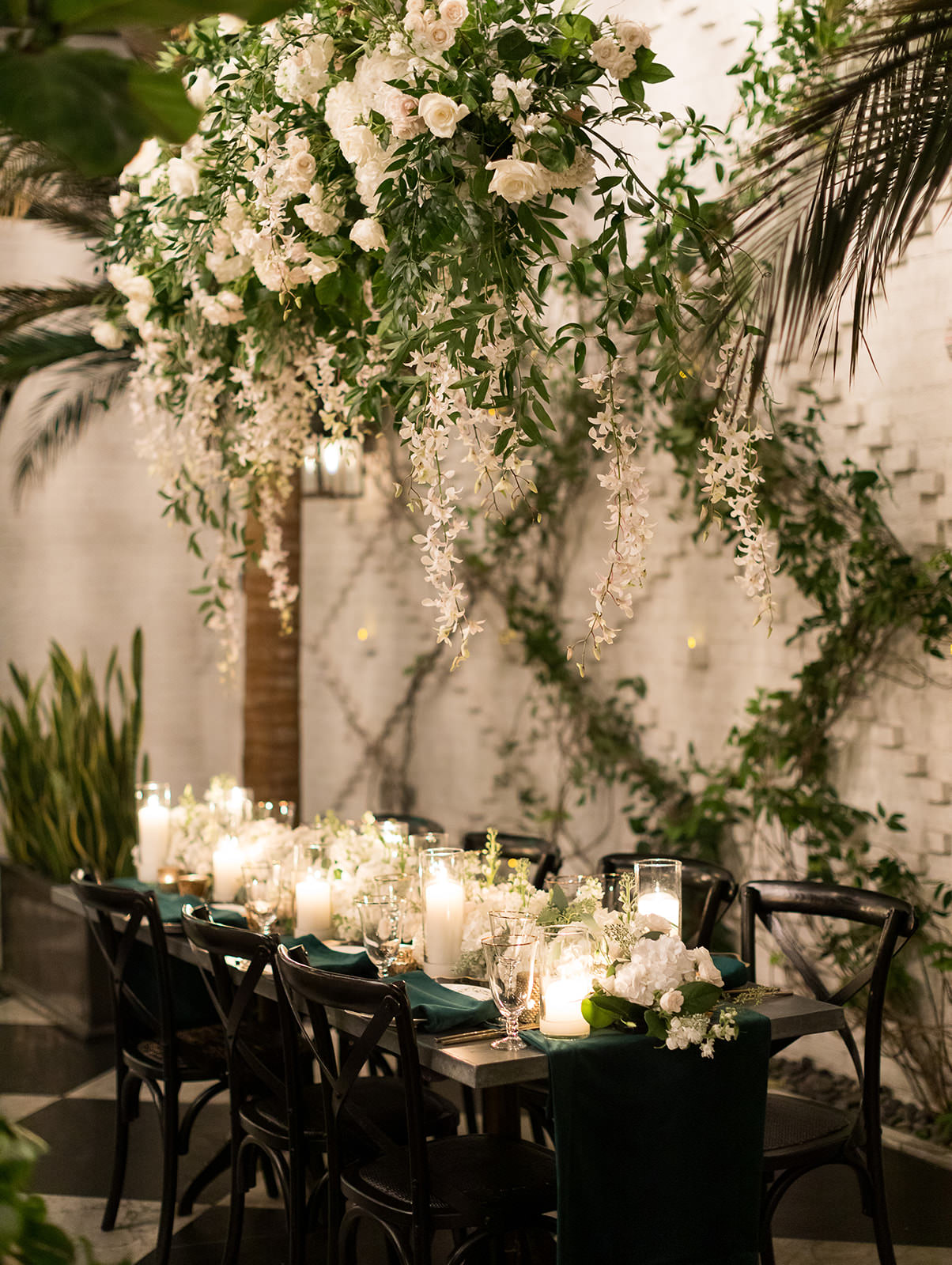 Classic Wedding Reception Decor, Long Tables with Green Linen Table Runners, Candles, Low White Floral Centerpieces, Wooden Cross Back Chairs | Tampa Bay Wedding Florist Botanica | Wedding Venue Oxford Exchange
