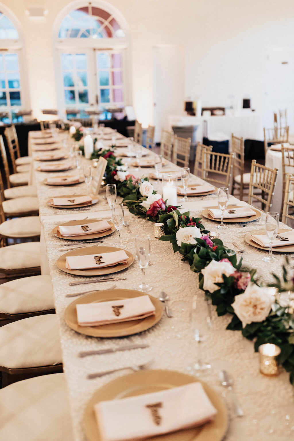 Warm Romantic Neutral Wedding Reception Decor, Long Feasting Table, Gold Chiavari Chairs, Berry, Blush Pink and Ivory Floral Centerpieces, Gold Chargers | Tampa Bay Wedding Planner Coastal Coordinating | Wedding Rentals Kate Ryan Event Rentals, Over the Top Linens | Wedding Venue The Orlo
