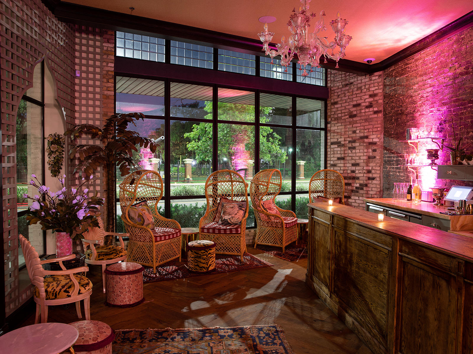 Unique Wedding Afterparty Lounge, Rattan Armchair, Neon Pink Light | Tampa Bay Wedding Venue Oxford Exchange