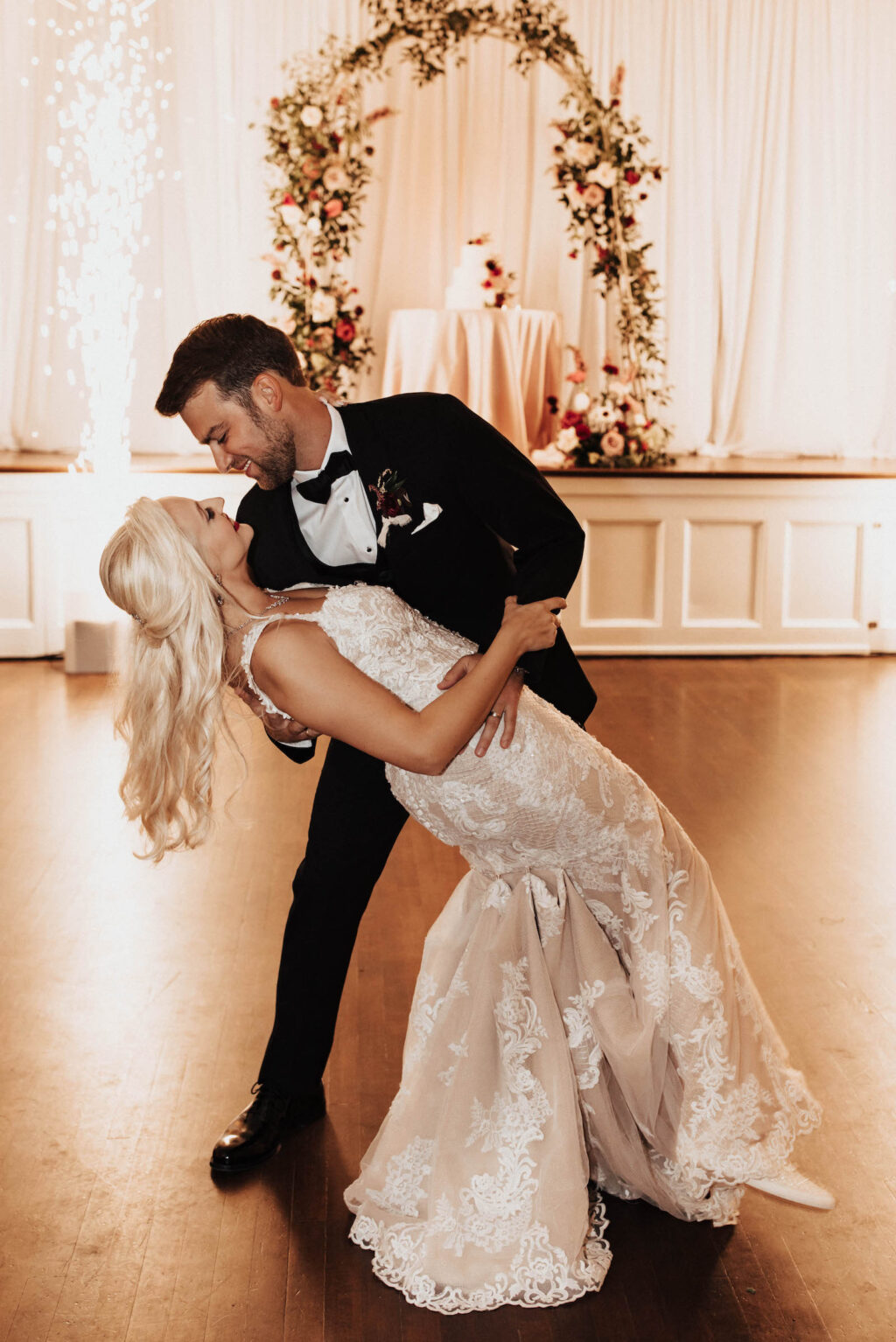 Warm Romantic Neutral Wedding Reception, Bride and Groom First Dance with Sparkler Fountain | Tampa Bay Wedding Planner Coastal Coordinating | Wedding DJ Grant Hemond & Associates | Wedding Sparkler Spark Wedding Events