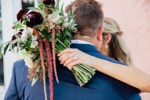 Elegant Navy Wedding, Bride and Groom Portrait, Greenery, Ivory Roses and Dark Purple Flowers with Red Hanging Amaranthus Bridal Bouquet | Tampa Bay Wedding Florist Botanica