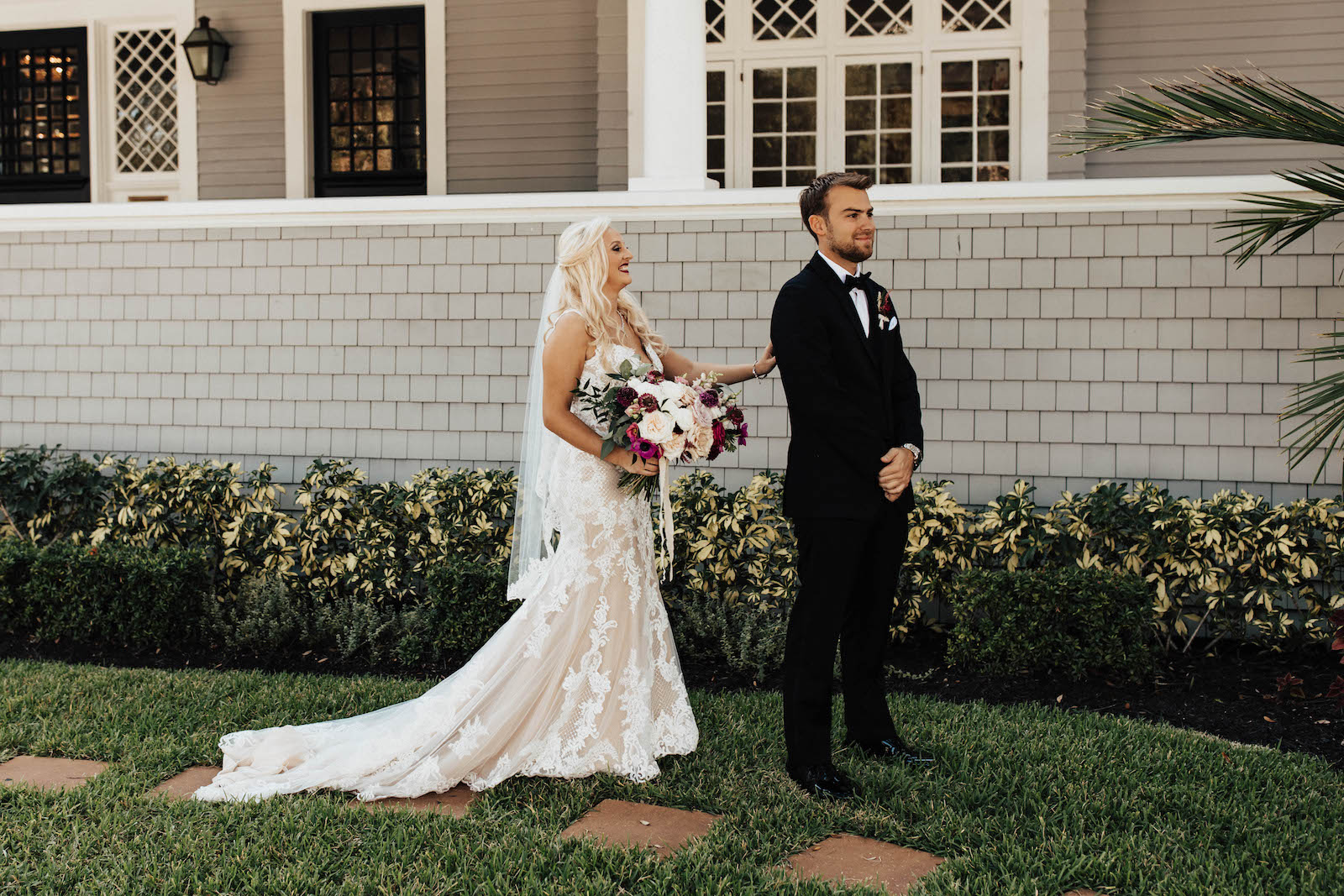 Warm Romantic Neutral Wedding, Bride Wearing Lace and Illusion with Nude Lining Wedding Dress First Look with Groom