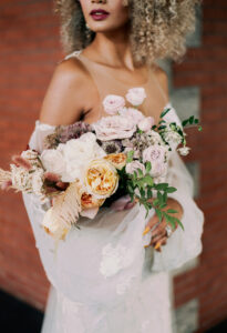 Vintage European Bride Holding Organic Blush Pink and Yellow Roses, Greenery and Dried Leaves Floral Bouquet Beauty Wedding Portrait | Tampa Bay Wedding Photographer Dewitt for Love