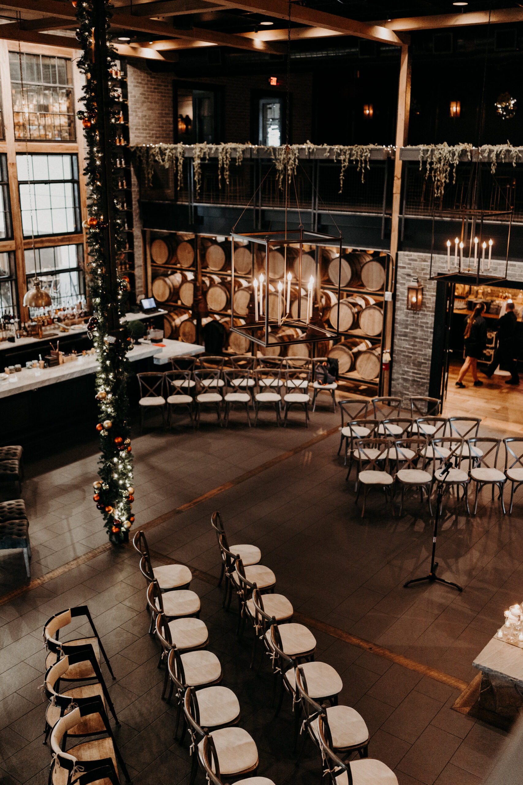 Industrial Indoor Wedding Ceremony with White and Gold Chairs | Downtown St. Pete Wedding Ceremony Florida Wedding Venue Urban Stillhouse
