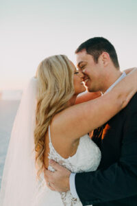 Bride and Groom Kissing on the Beach Wedding Portrait | St. Petersburg Wedding Photographer Amber McWhorter Photography