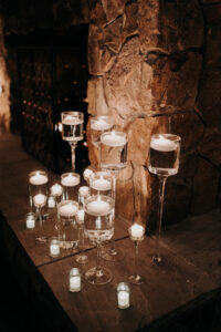 Floating Candles in Clear Jars Moody Wedding Decor