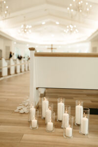 Timeless Neutral White and Black Safety Harbor Chapel Wedding Ceremony | Harborside Chapel with White Candle in Glass Jar Aisle Details
