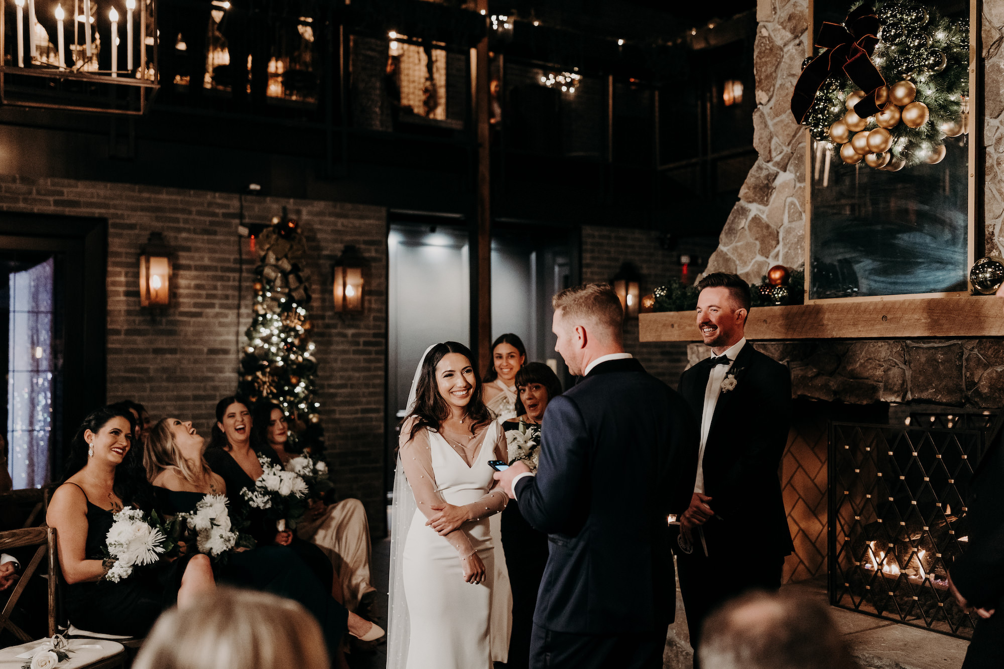 Bride and Groom Exchanging Vows in Dark and Moody Industrial Wedding Ceremony | Florida Wedding Venue Urban Stillhouse