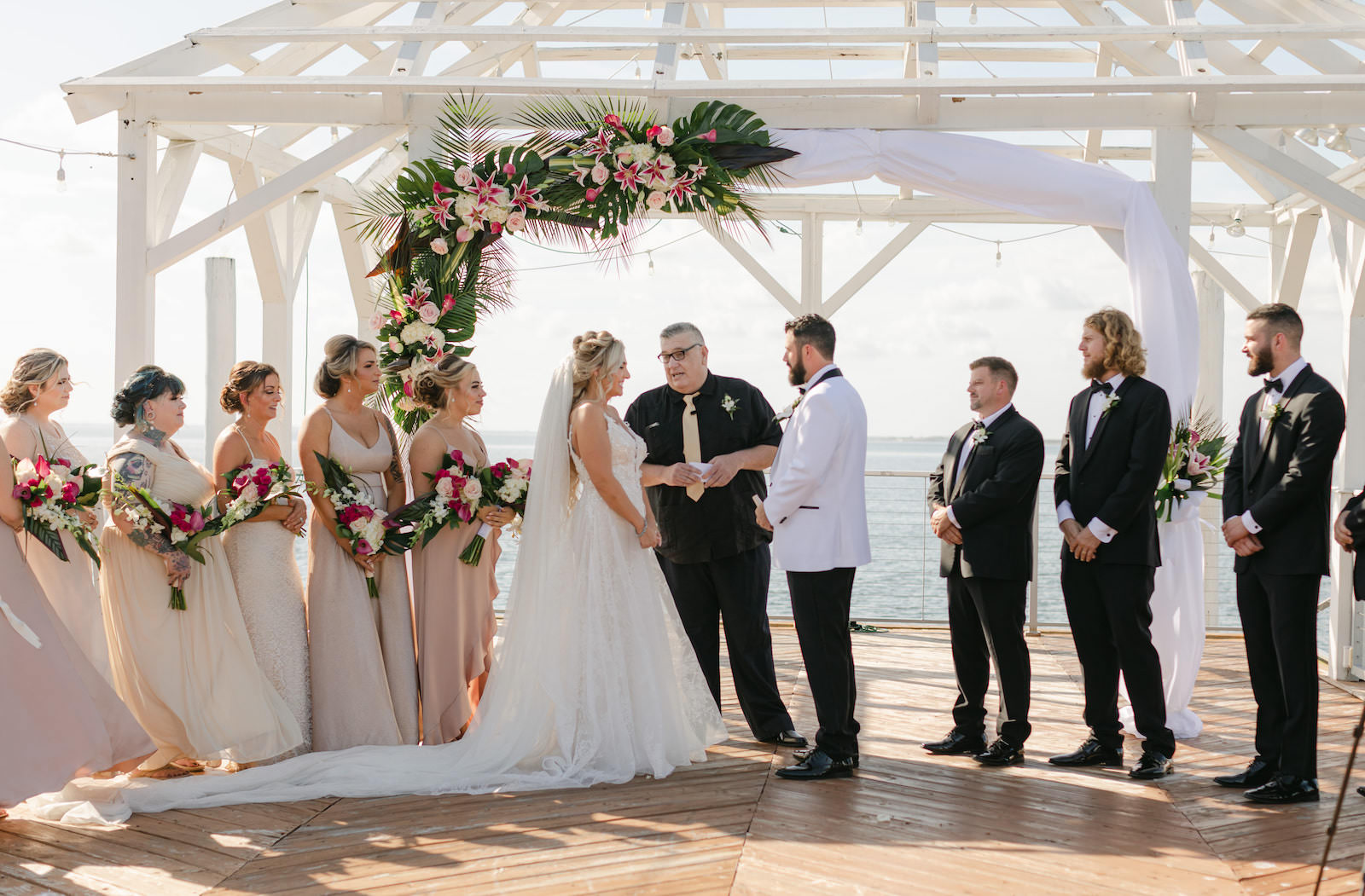 Tropical Modern Bride and Groom Exchanging Vows During Waterfront Wedding Ceremony | Tampa Bay Wedding Venue The Godfrey