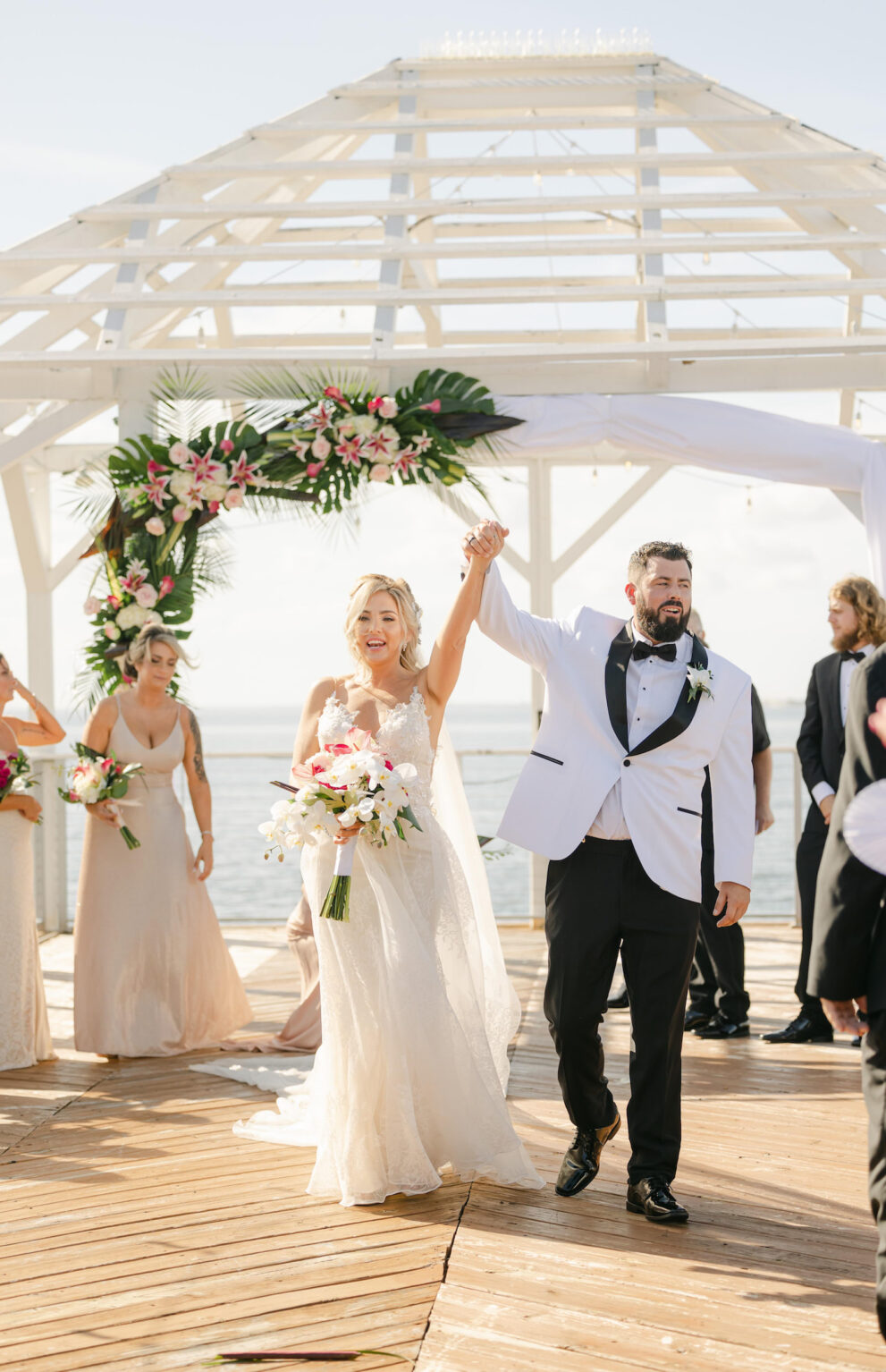 Tropical Modern Bride and Groom Exchanging Vows During Waterfront Wedding Ceremony | Tampa Bay Wedding Venue The Godfrey