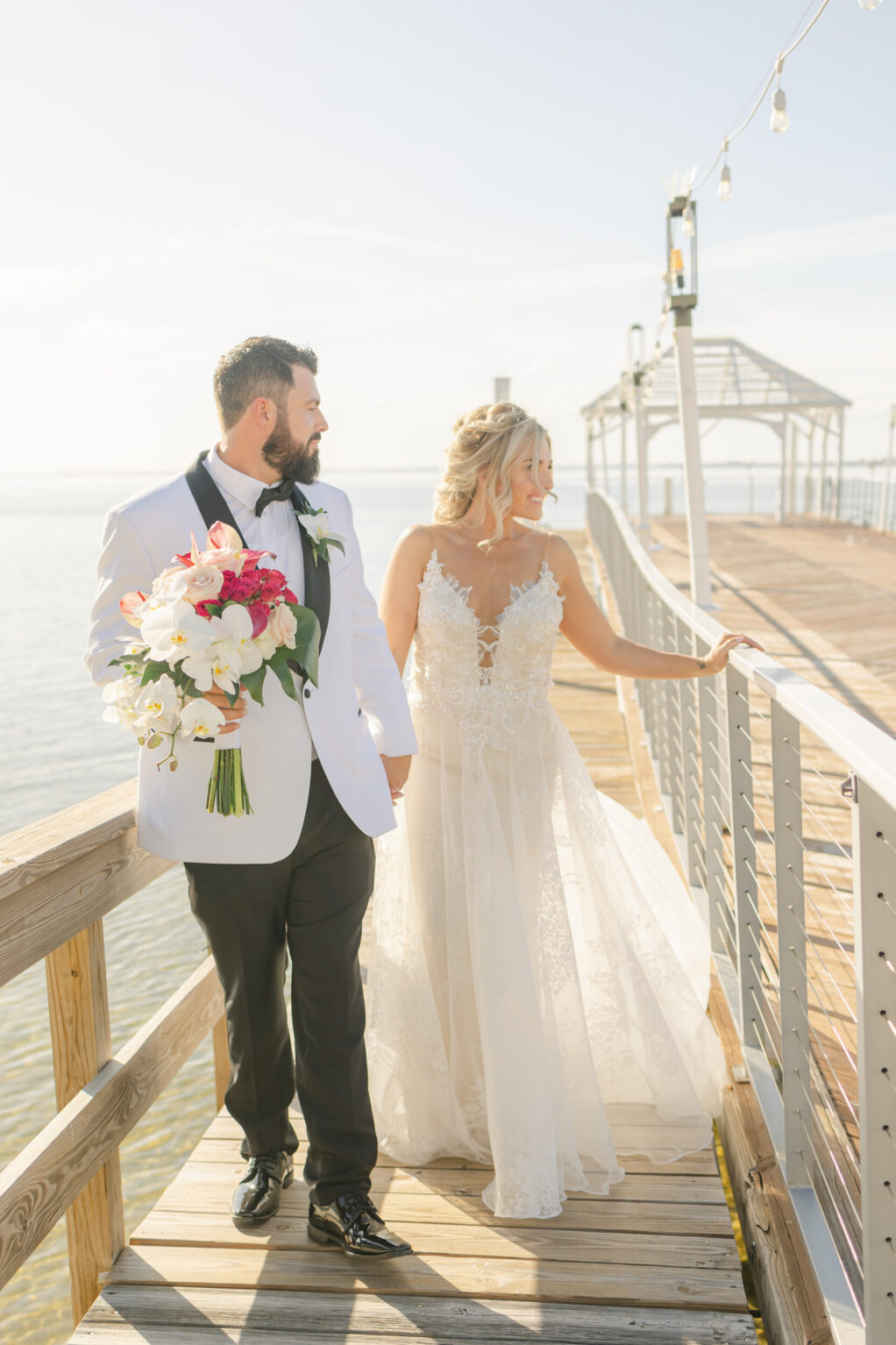 Florida Bride and Groom Sunset Wedding Portrait on Dock | Tampa Bay Wedding Venue The Godfrey