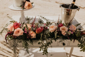 Champagne Table with Rose Florals and Greenery Beach Side for Elopement | Elope Tampa Bay