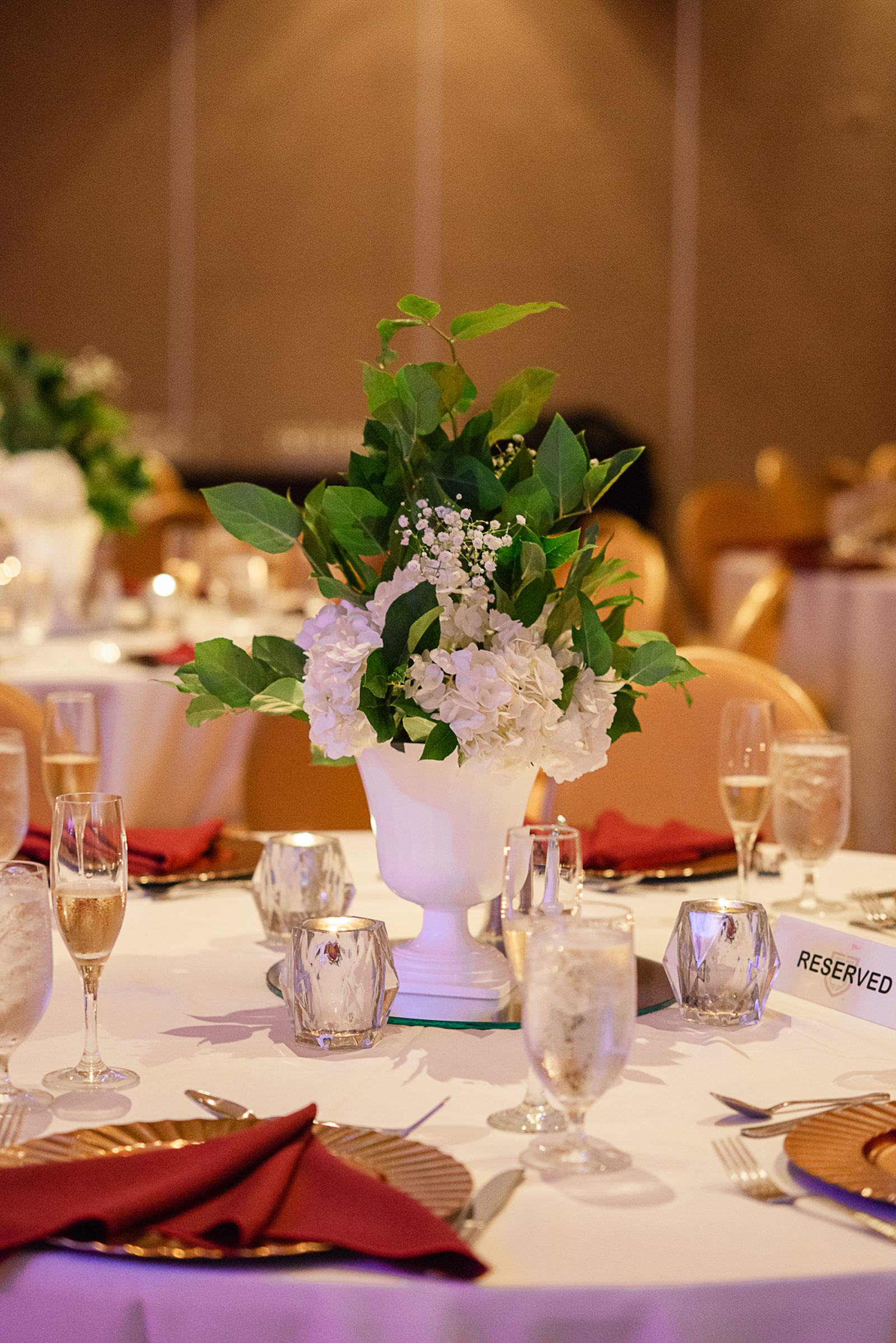Greenery with White Floral Centerpieces