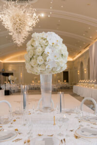 Timeless Classic Wedding Reception Ballroom Decor, Tall Glass Vases with White Roses and Orchids, Gold Silverware | Tampa Bay Wedding Planner Parties A'la Carte | St. Pete Wedding Venue The Vinoy Renaissance | Wedding Florist Bruce Wayne Florals