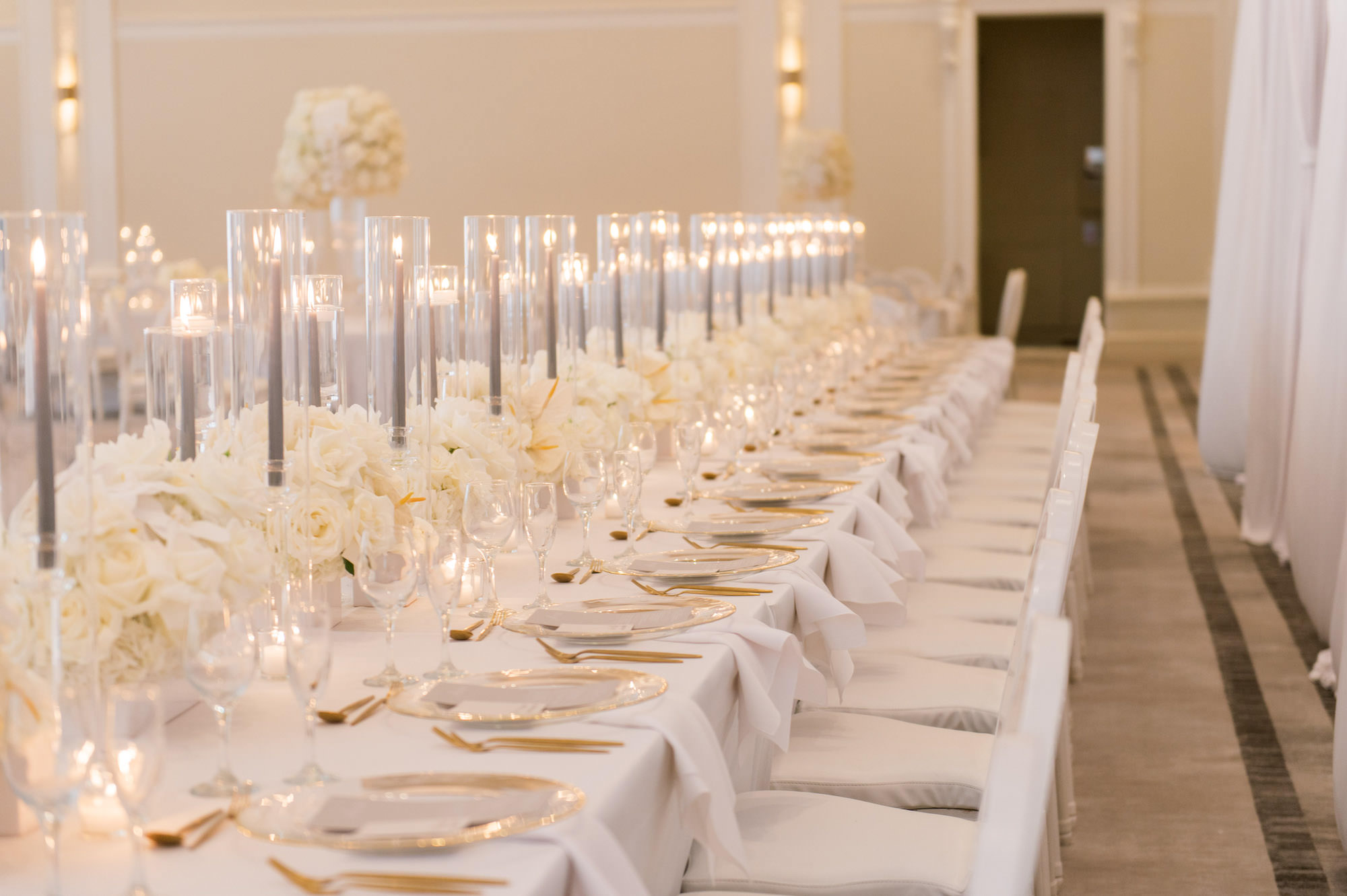 Timeless Classic Wedding Reception Decor, Head Table with Round All White Rose Flower Centerpieces, Tall Candlesticks, Gold Silverware | Tampa Bay Wedding Planner Parties A'la Carte | Wedding Florist Bruce Wayne Florals