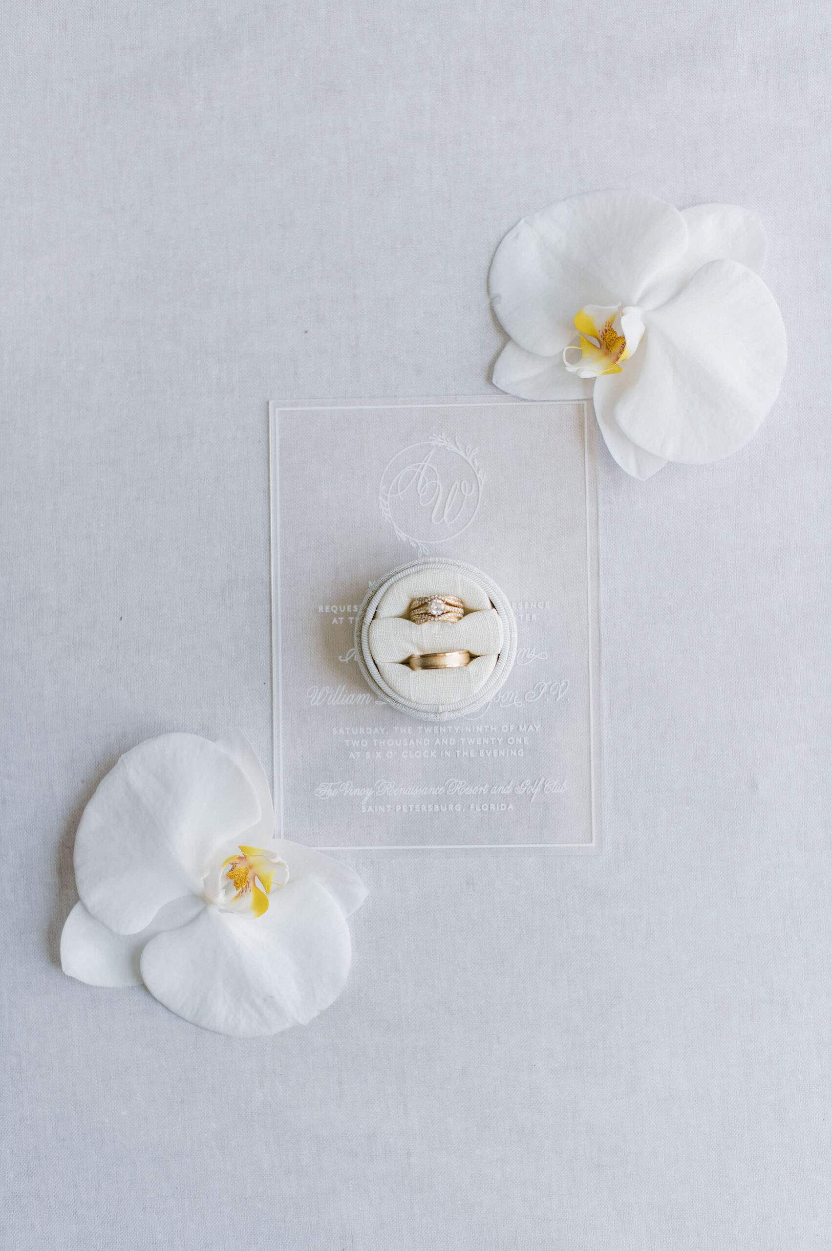 Timeless Classic Wedding, White Orchid Petals, Acrylic Wedding Invitation, Yellow Gold Engagement Ring and Wedding Ring in Round Ring Box