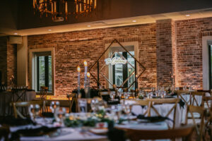 Industrial Indoor Wedding Reception White Linens and Crossback Chairs | Red Mesa St. Petersburg Florida Wedding Venue