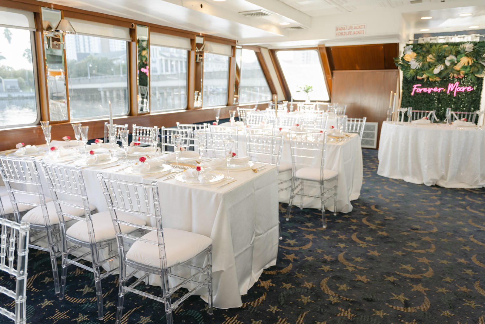 Tropical Modern Wedding Reception Decor, Long Tables with White Linens, Acrylic Chiavari Chairs | Tampa Bay Wedding Rentals Kate Ryan Event Rentals | Wedding Venue Yacht StarShip