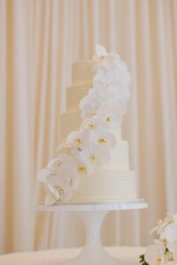 Timeless Classic Wedding Reception, Five Tier Textured White Wedding Cake with Cascading White Orchid Flowers | Tampa Bay Wedding Florist Bruce Wayne Florals