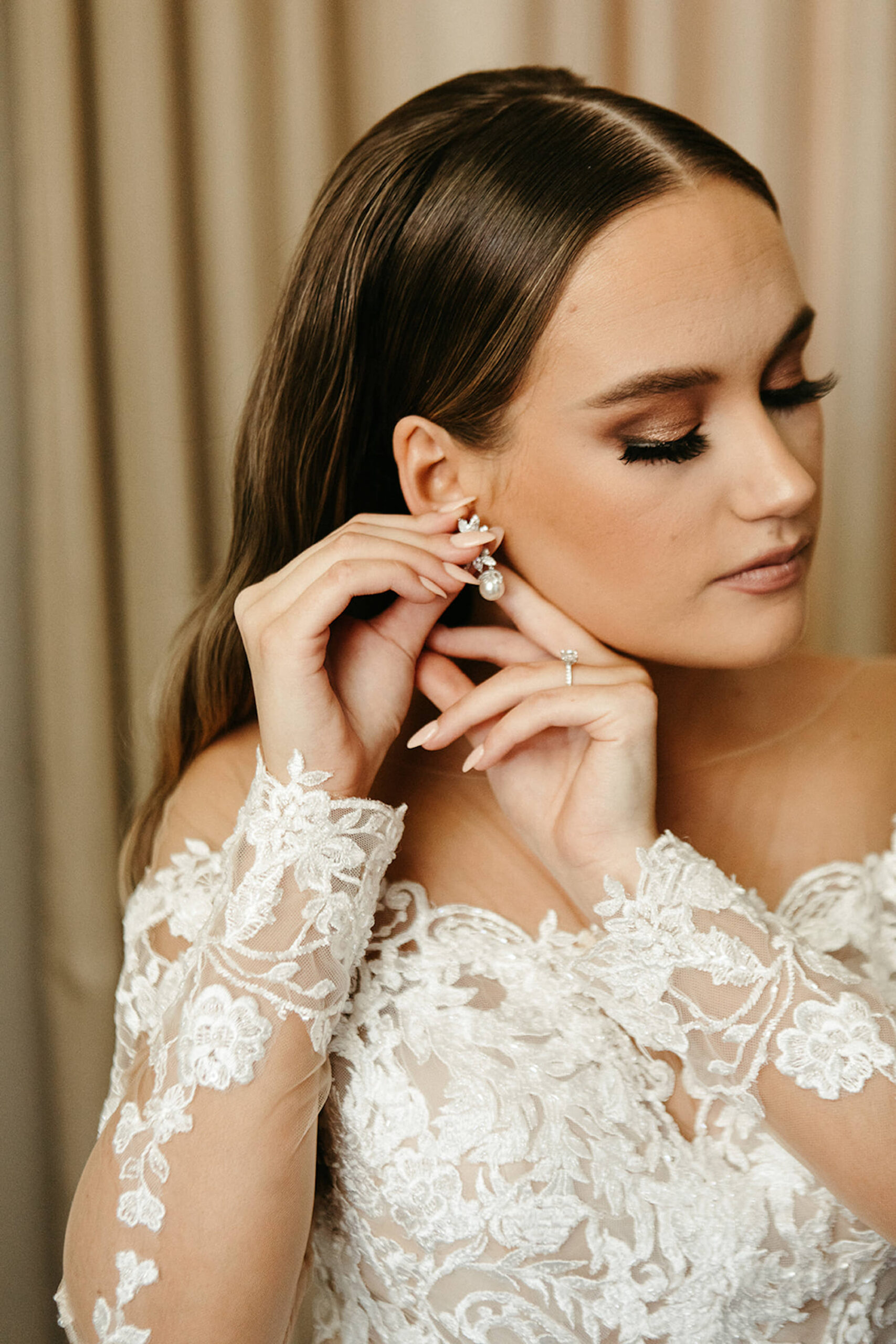 Bride Getting Ready Portrait with Glam Makeup and Off the Shoulder Lace Wedding Dress