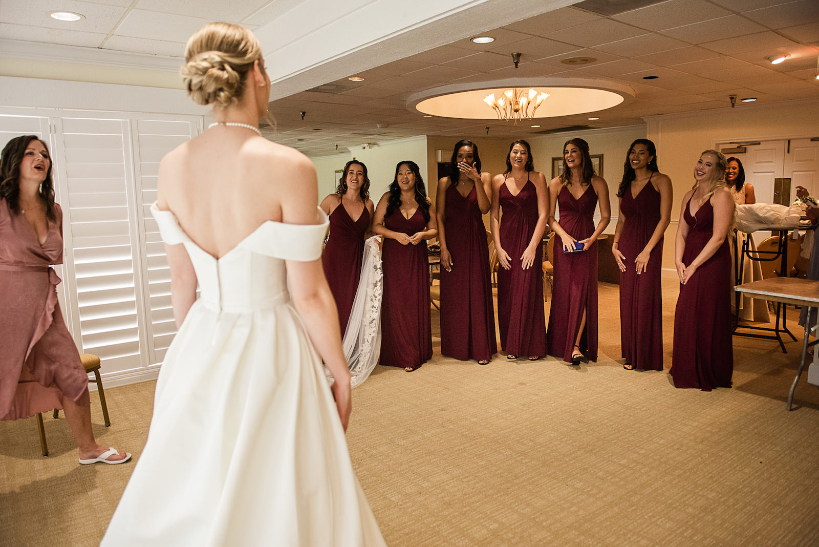 Bride First Look with Bridesmaids in Wine Colored Floor Length Bridesmaids Dress Portrait | Joyelan Photography