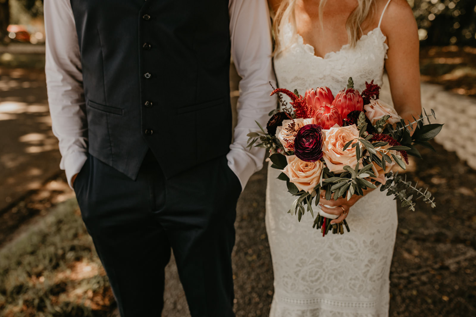 Detail Shot of Bride and Groom with Boho Rose and Greenery Bouquet | Florida Wedding Venue Isla Del Sol
