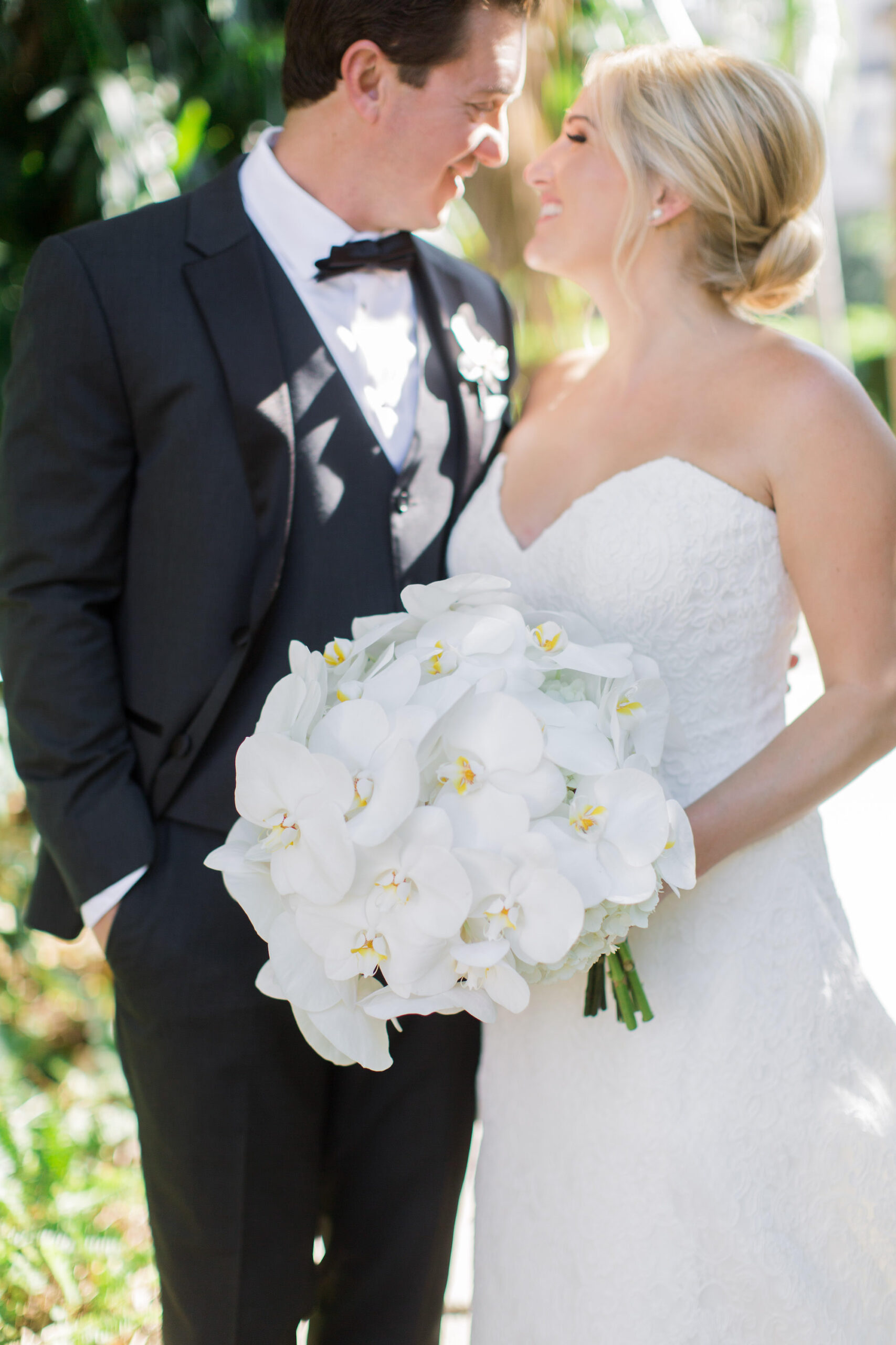 Timeless Classic Wedding, Bride and Groom First Look Wedding Portrait, White Orchid Floral Bouquet | Tampa Bay Wedding Florist Bruce Wayne Florals
