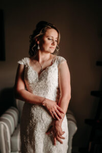 Bride in Lace Cap Sleeve Wedding Dress Portrait