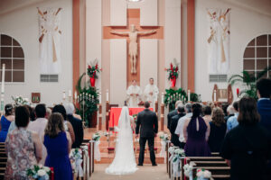 Church Wedding Ceremony Venue in Florida | Bride and Groom Exchange Vows Wedding Portrait